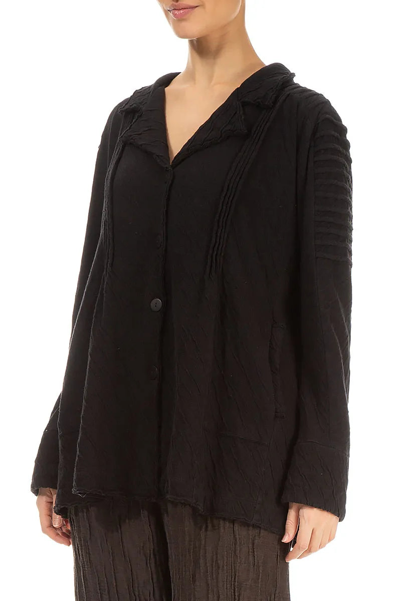 Veste en coton ondulé noir à épaules détaillées