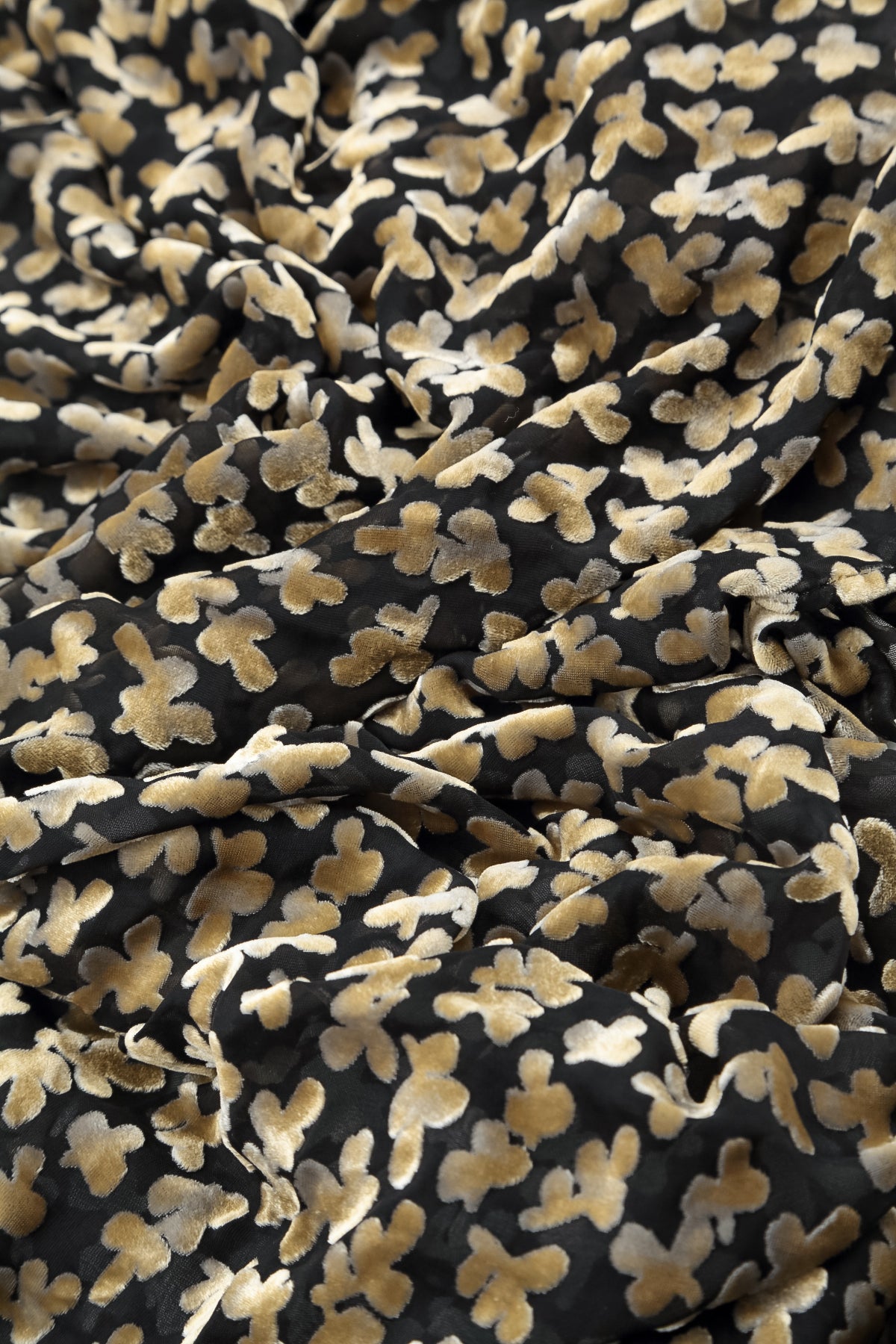 Chemisier en velours de soie doré à pétales dévorés superposés