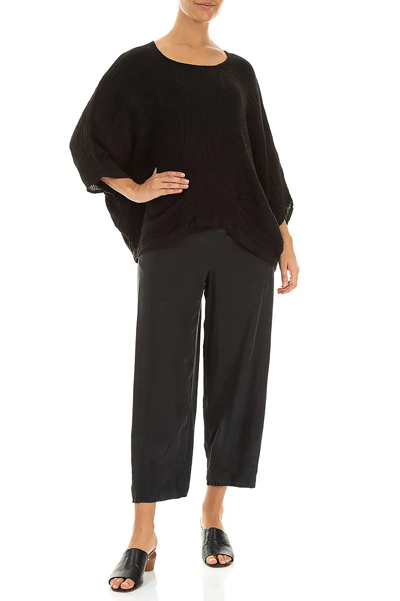 Lockere Bluse aus schwarzer Seide im Knitterlook