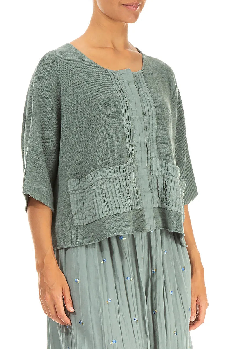 Cardigan en lin sauge à plis piqués sur le devant