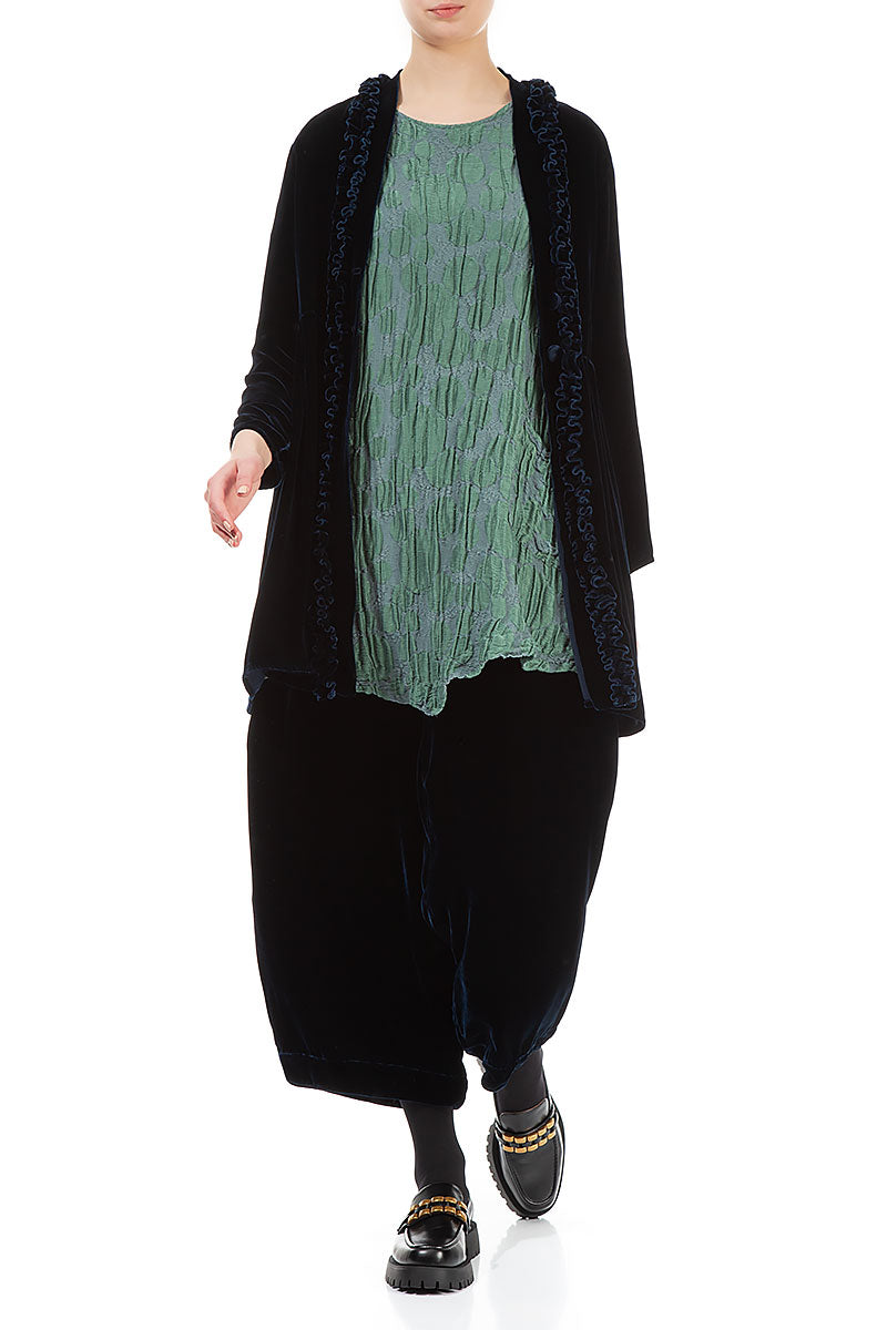 Veste en velours de soie bleu marine à volants