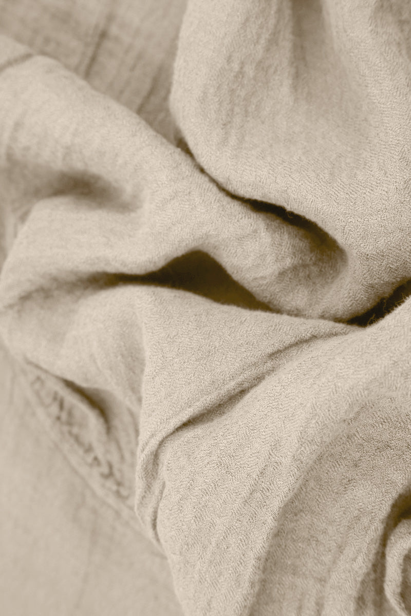 Haut en lin beige sans manches