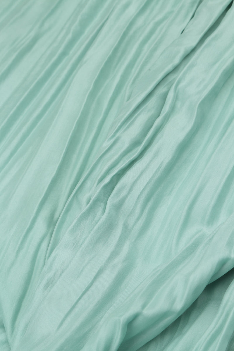 Pantalon ample et fluide en pure soie froissée couleur menthe