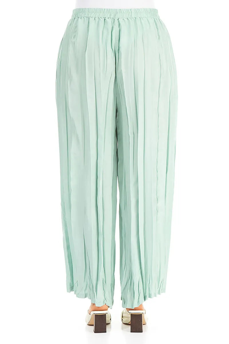 Pantalon ample et fluide en pure soie froissée couleur menthe