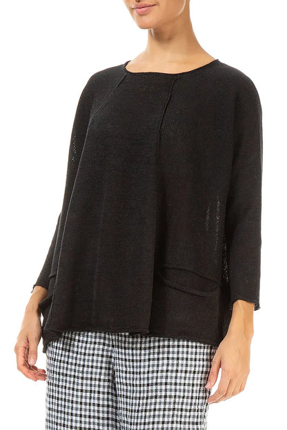 Pull en lin noir à deux poches et coupe trapèze
