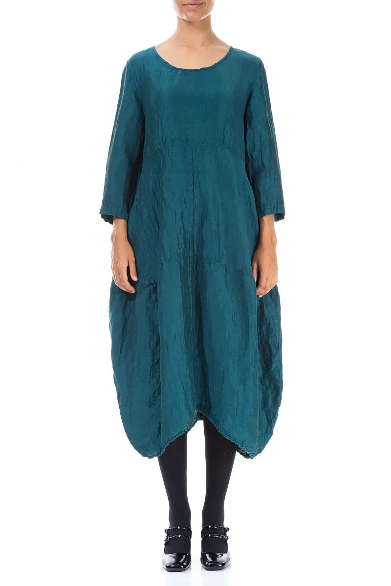 Robe couleur bleu paon texturée en soie et lin, coupe ballon