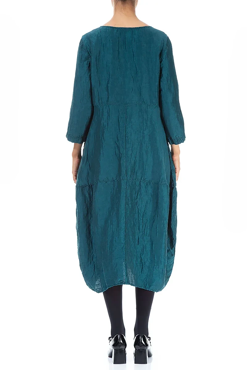 Robe couleur bleu paon texturée en soie et lin, coupe ballon