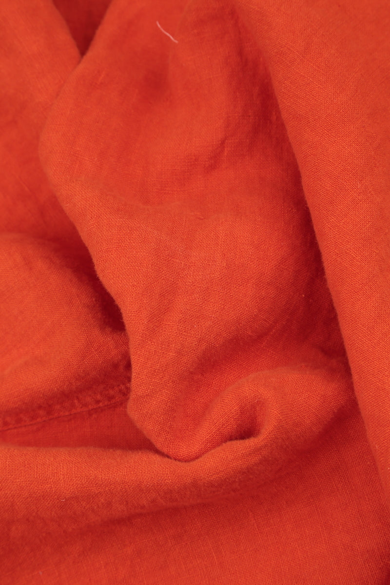 Pantalon en lin orange vif à boutons