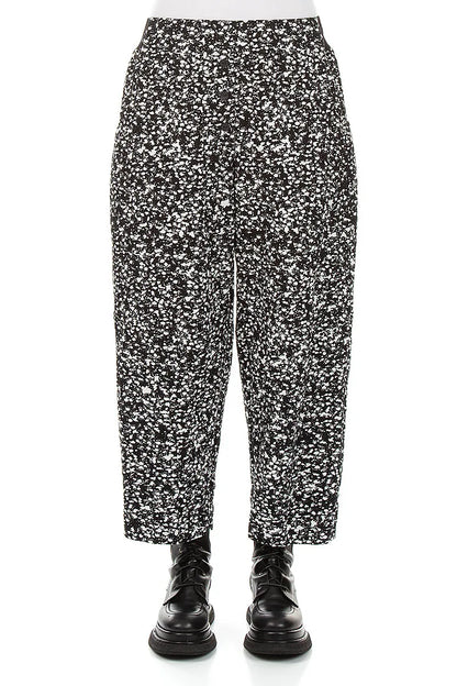 Pantalon boutonné en coton moucheté noir et blanc