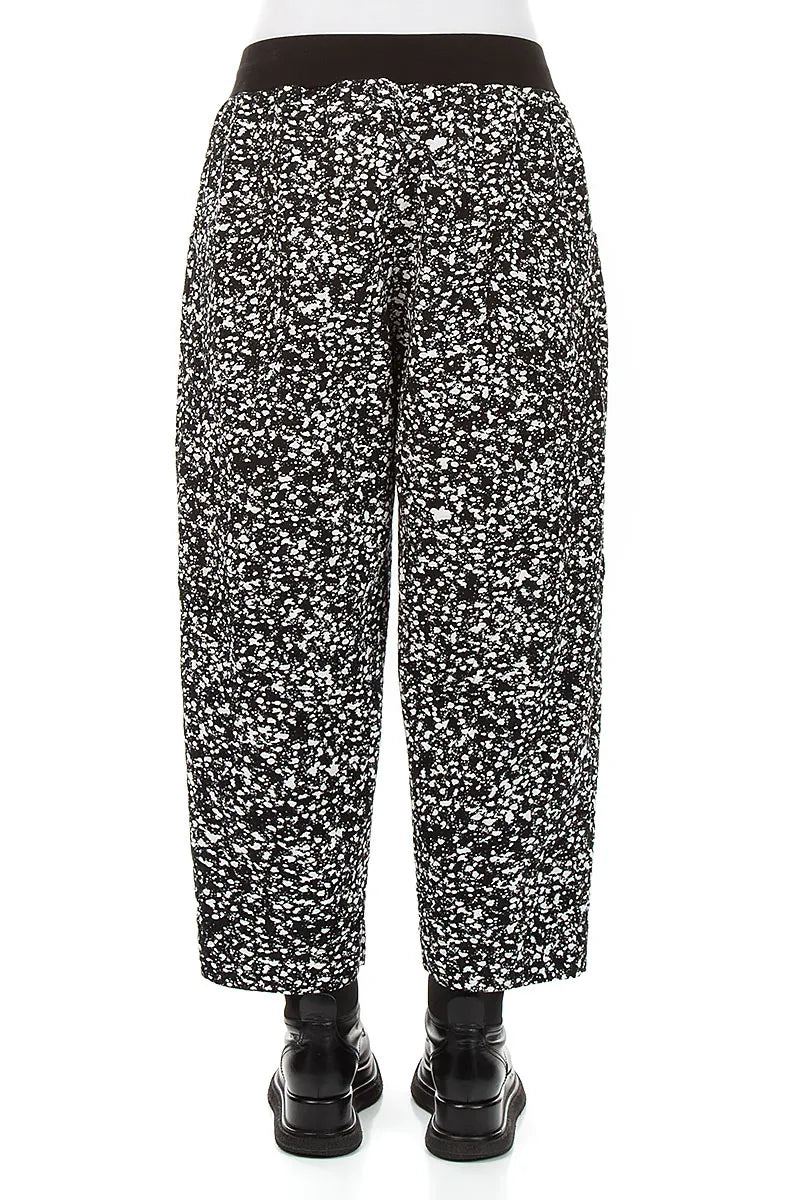 Pantalon boutonné en coton moucheté noir et blanc