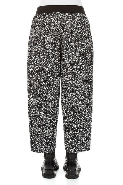 Pantalon boutonné en coton moucheté noir et blanc