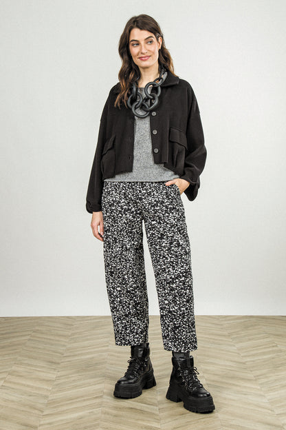 Pantalon boutonné en coton moucheté noir et blanc