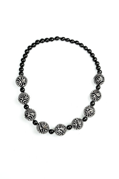 Collier de perles en bois Contour Rhythm