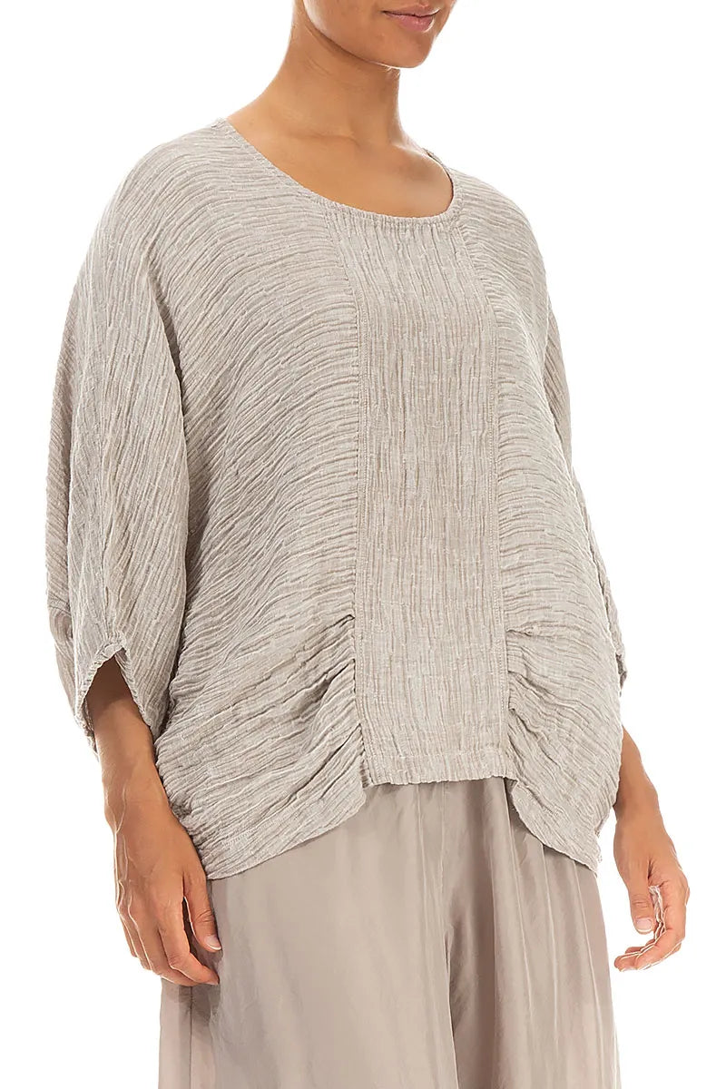 Chemisier en soie beige froissée à col bénitier