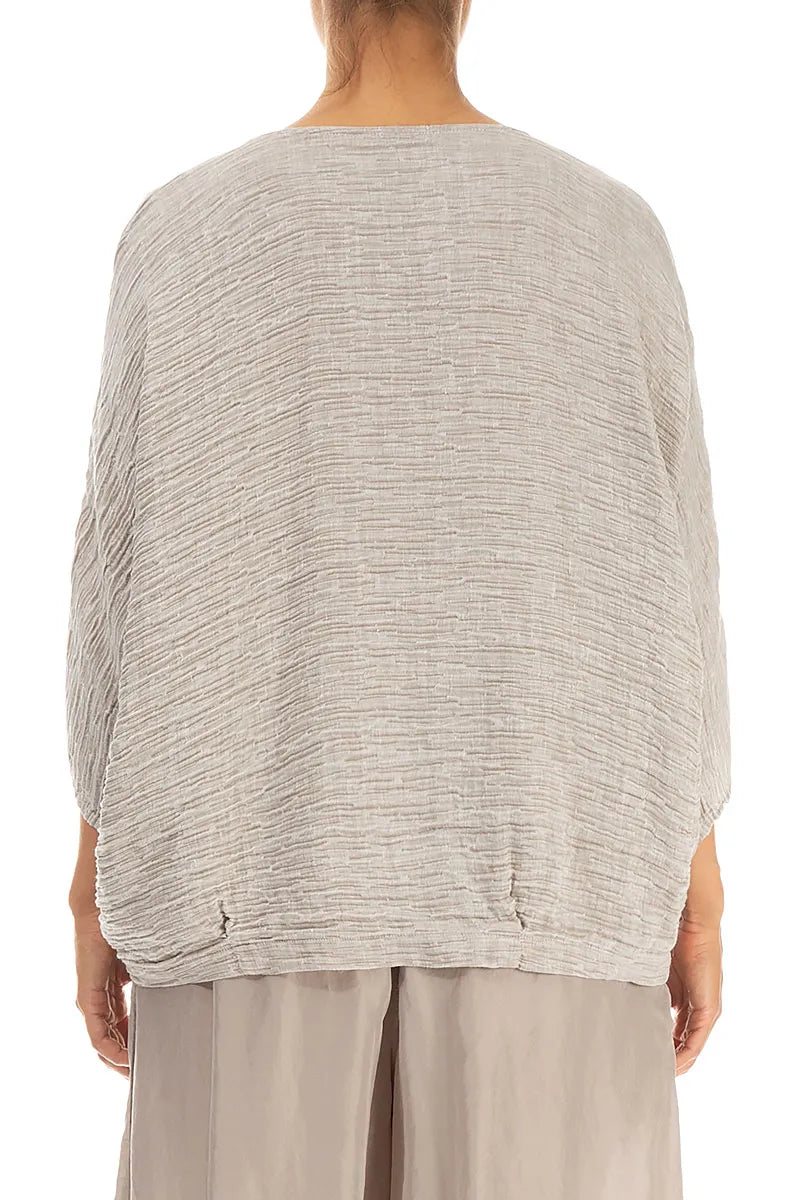 Chemisier en soie beige froissée à col bénitier