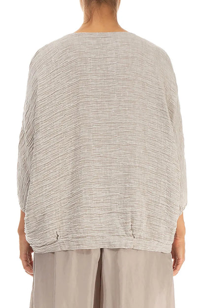 Chemisier en soie beige froissée à col bénitier