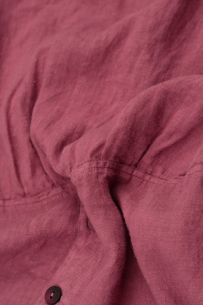 Ausgestellte antikrote Leinenbluse