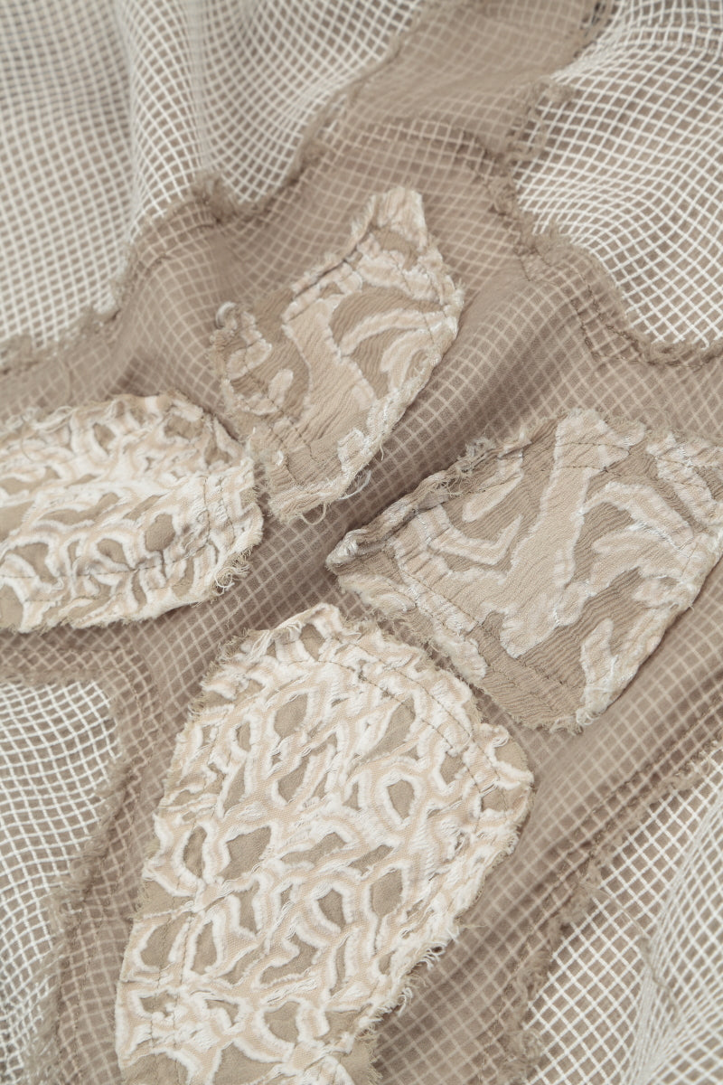 Robe évasée papillon beige en maille de soie