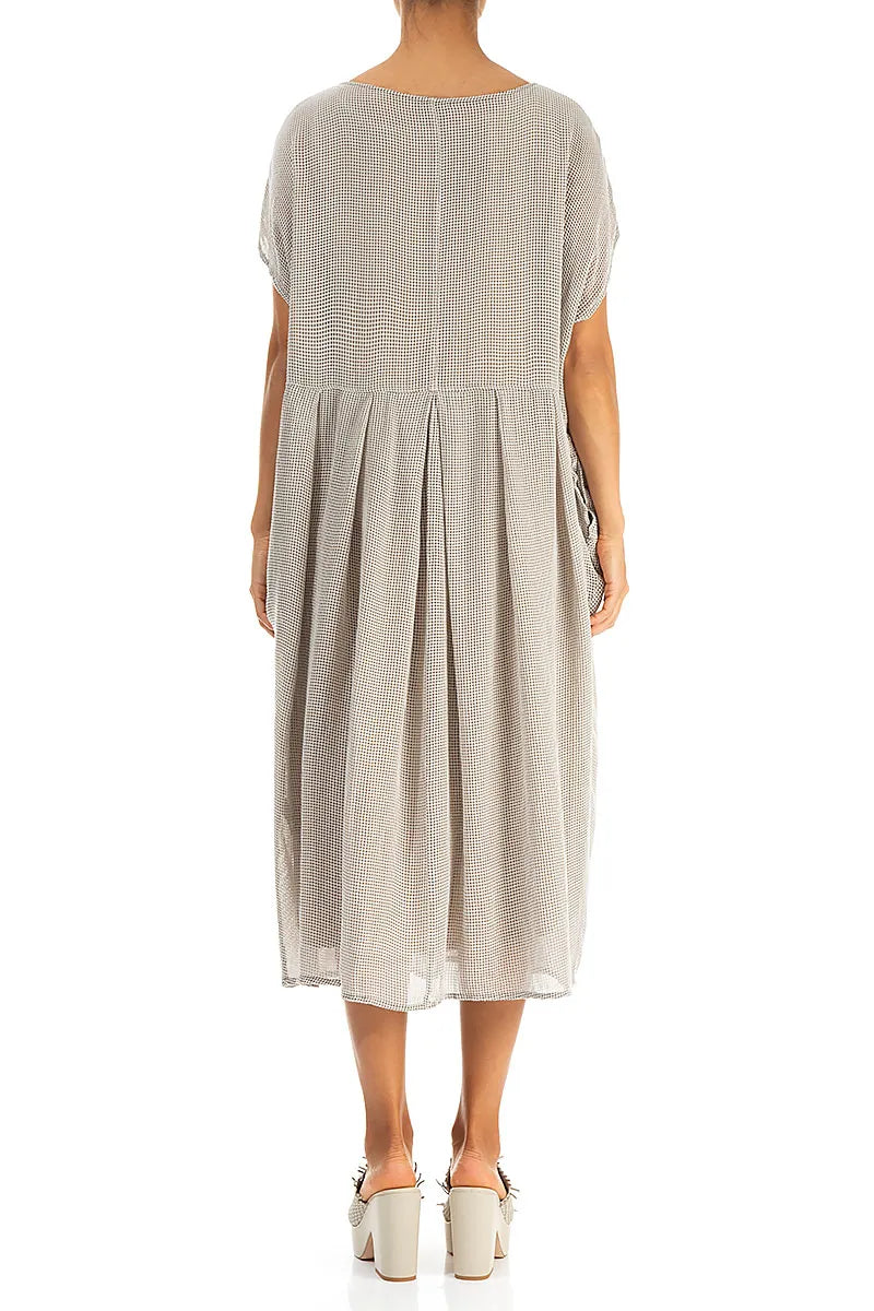 Robe évasée papillon beige en maille de soie