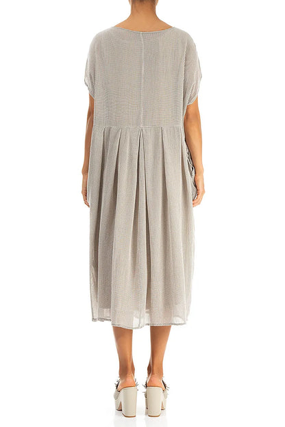 Robe évasée papillon beige en maille de soie