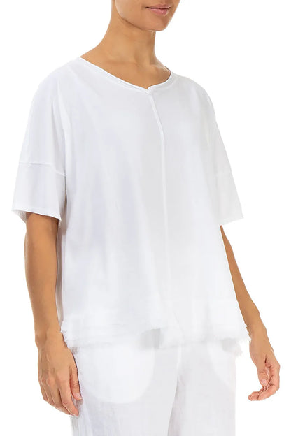 Haut blanc en coton à ourlet effiloché
