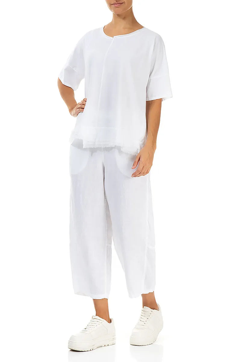 Haut blanc en coton à ourlet effiloché