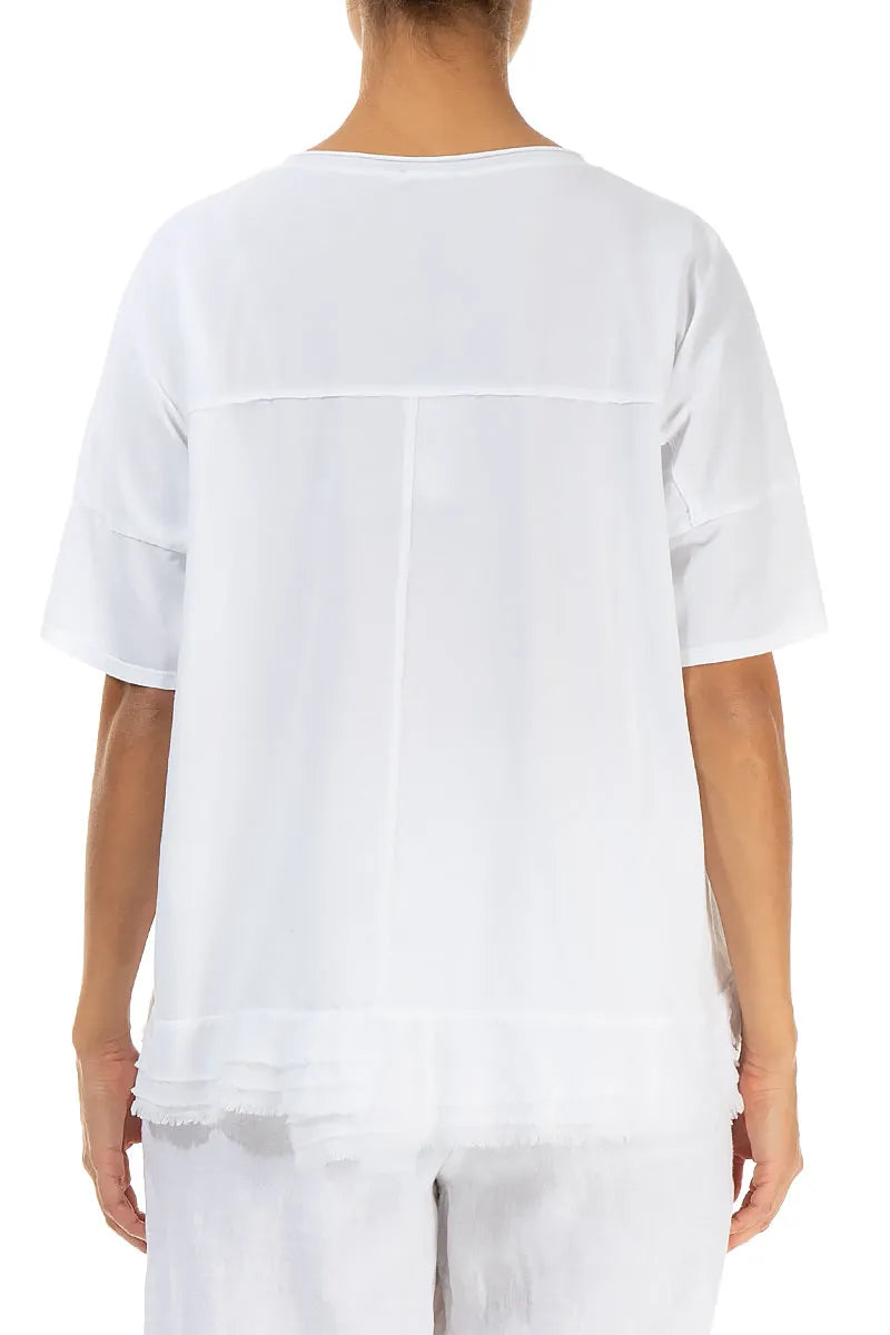 Haut blanc en coton à ourlet effiloché