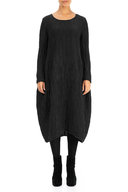 Robe noire froissée à manches longues, en soie et lin, coupe ballon