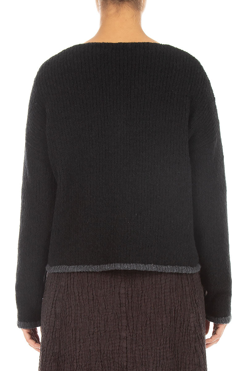 Gilet en laine noir plus long dans le dos