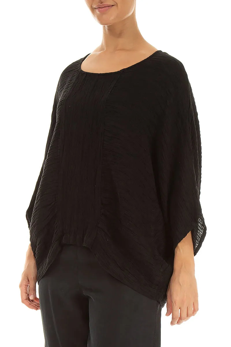 Lockere Bluse aus schwarzer Seide im Knitterlook
