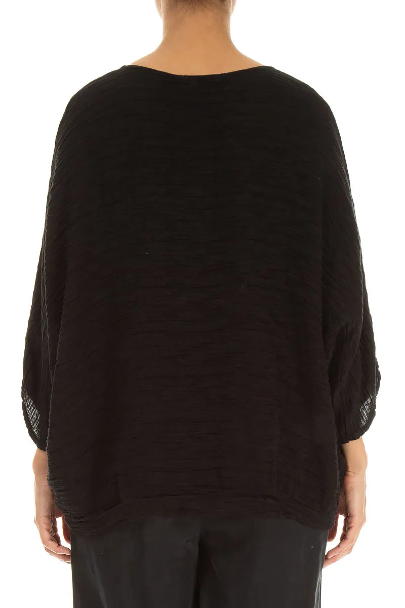 Lockere Bluse aus schwarzer Seide im Knitterlook