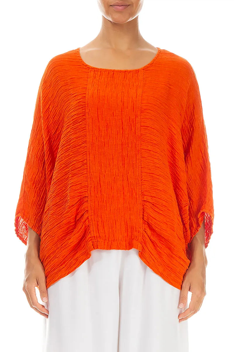 Lockere, gekreppte, flammenorangefarbene Seidenbluse