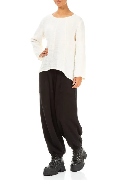 Lockere, cremefarbene Leinenbluse mit Struktur