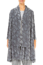 Person wearing a long, patterned gray jacket on a white background