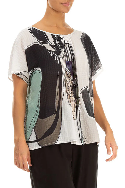 Chemisier en soie texturée effet pierre roulée à plis piqués