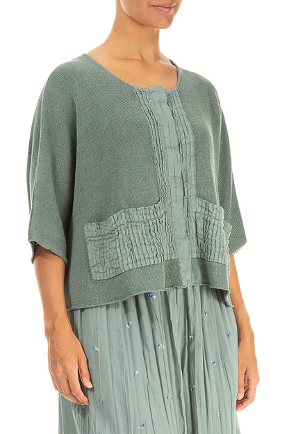 Cardigan en lin sauge à plis piqués sur le devant