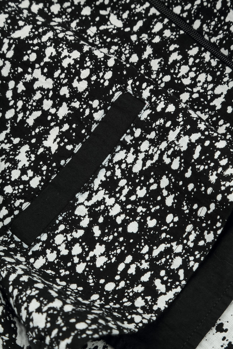 Veste-manteau réversible en coton moucheté noir et blanc