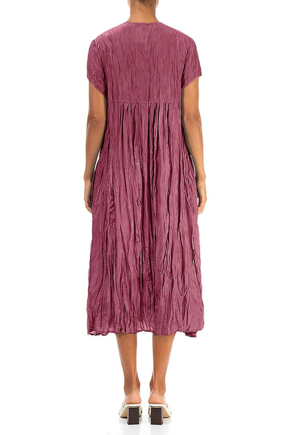 Romantisches Kleid aus reinseidenem Crêpe mit antiken Rubinen