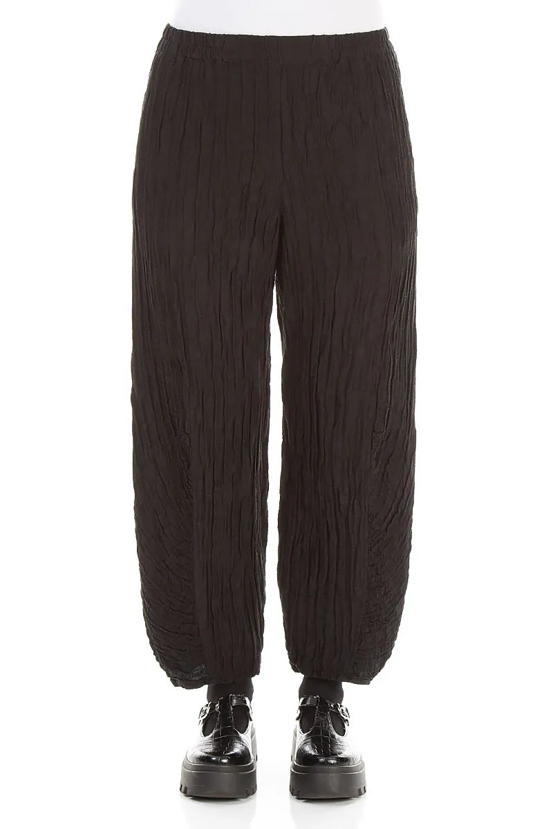 Pantalon en lin et soie froissé noir à ourlet froncé