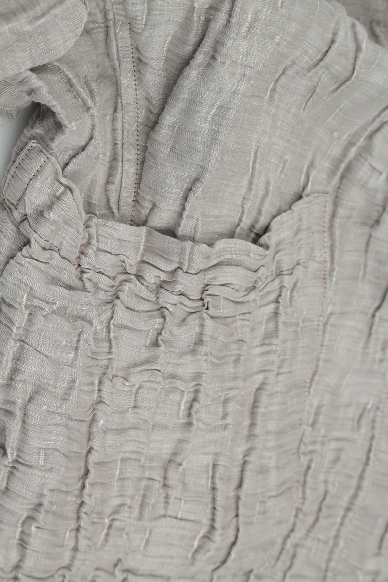 Veste courte en soie beige froissée