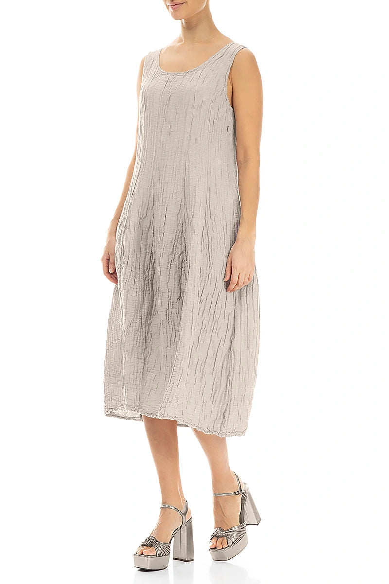 Robe sans manches en soie et lin beige froissé, à volants bouffants