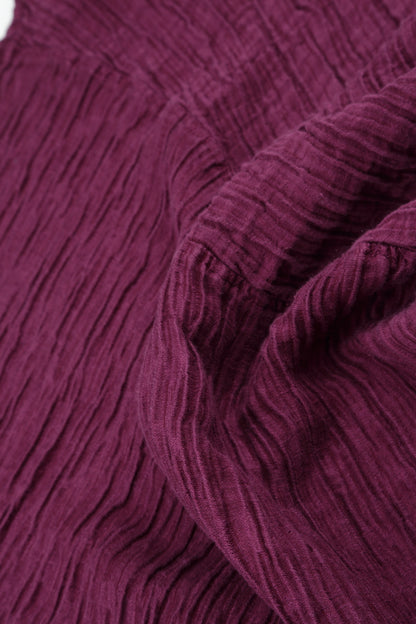 Robe sans manches en soie magenta froissée à volants