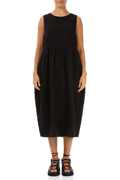 Robe sans manches en lin noir avec plis nervurés