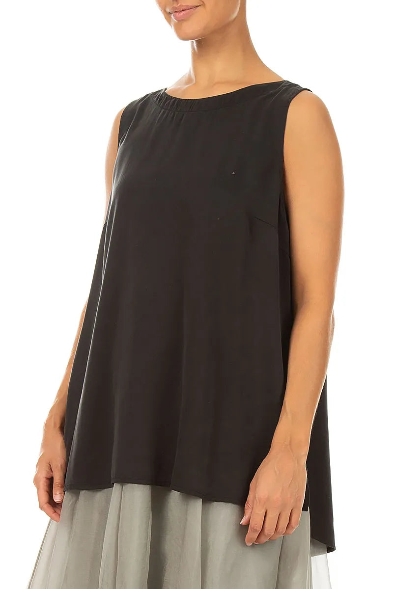 Blouses sans manches en soie noire, plus longues dans le dos