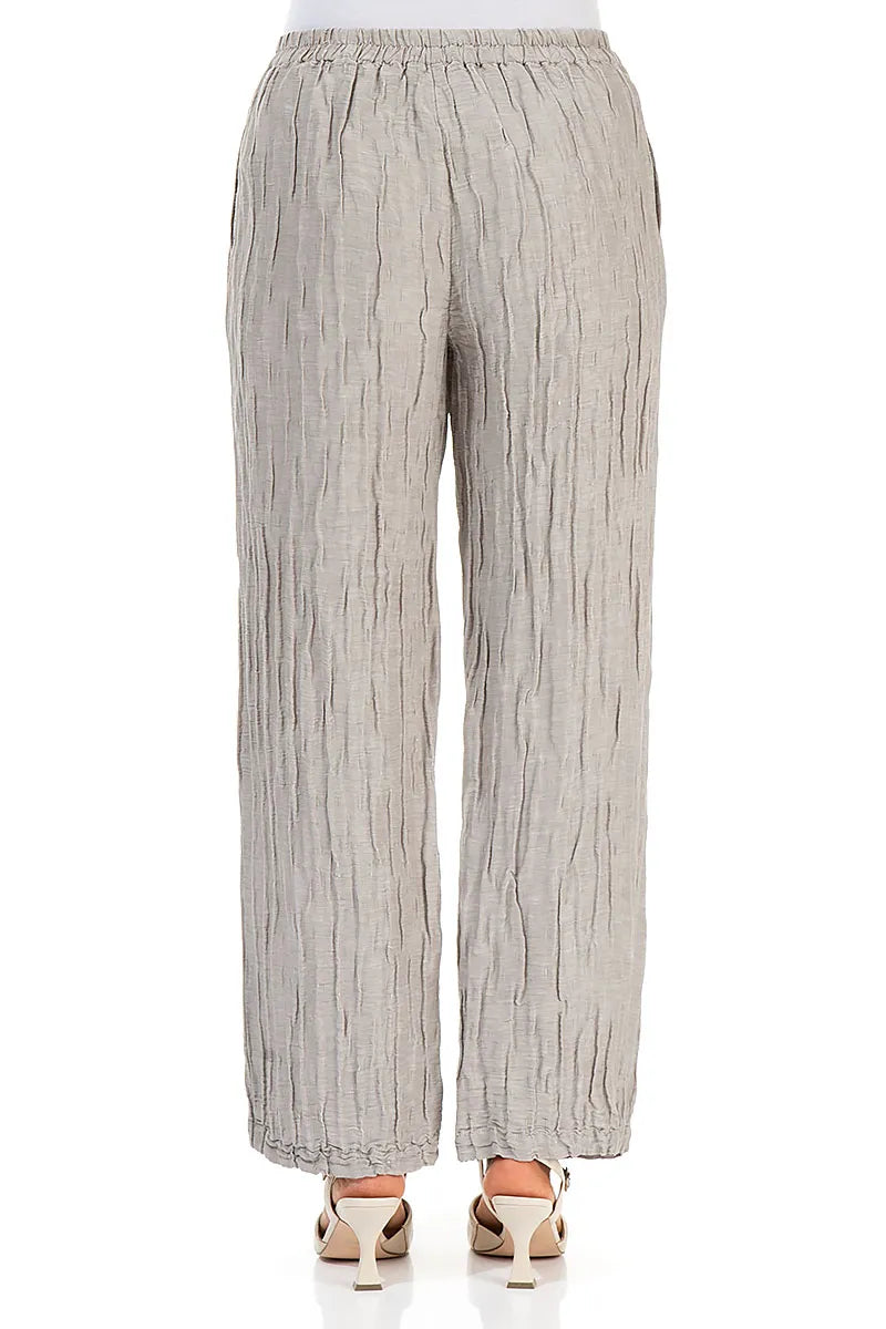 Pantalon droit en lin et soie beige froissé