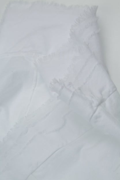Haut blanc en coton à ourlet effiloché