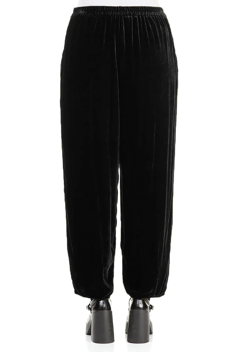 Pantalon fuselé en velours de soie noir