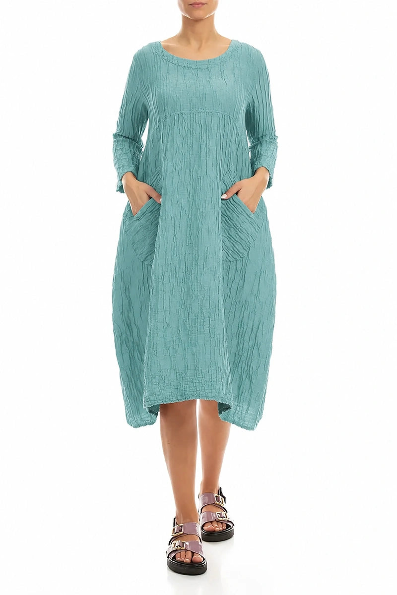 Robe en soie et lin froissés menthe à deux poches