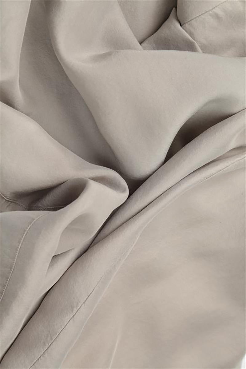 Pantalon ample et fluide beige en pure soie