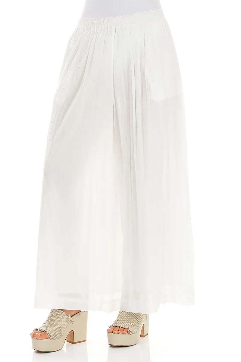 Pantalon large froissé en coton blanc cassé